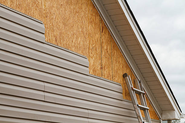 Professional Vinyl Siding technician working in Rossiter, PA